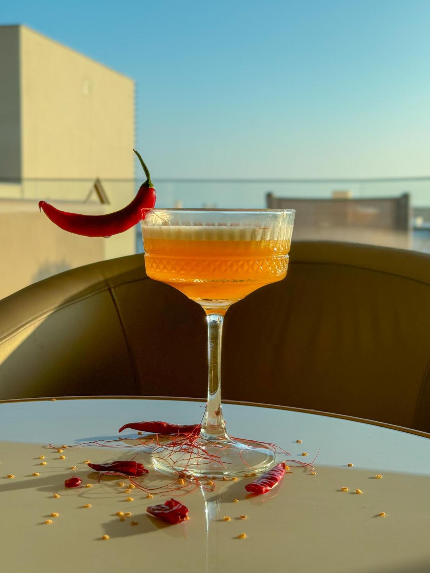 Amarande (Adults Only) Hotel Ayia Napa Bagian luar foto A chili pepper garnish
